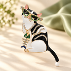 Enamel Cat with Sunglasses and Fishbone Necklace Brooch — styled background