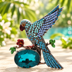 Jeweled Bird with Oval Faceted Stone Brooch — styled background