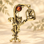 Vintage-Style Cat Reaching for a Birdcage Brooch — styled background