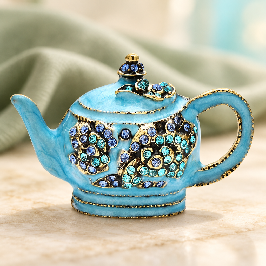 Ornate Enamel Teapot Brooch — styled background