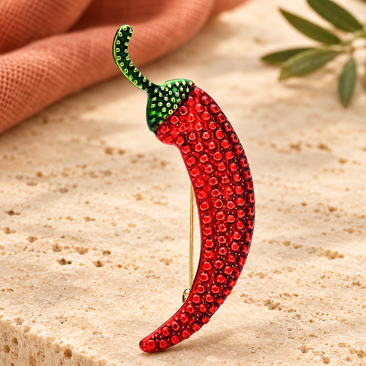 Rhinestone Chili Pepper Brooch — styled background
