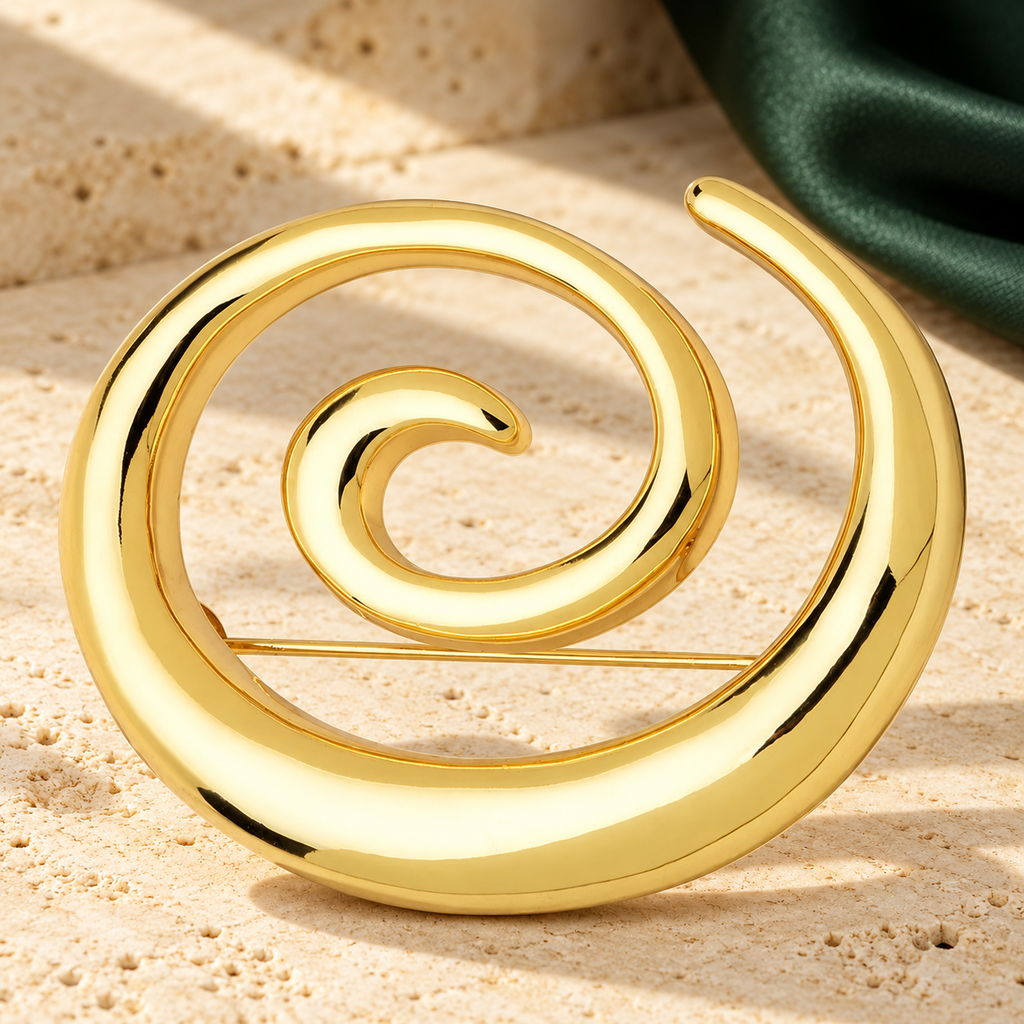 Openwork Stainless Steel Spiral Brooch — styled background