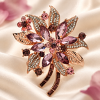 Jeweled Flower Spray with Textured Leaves Brooch — styled background