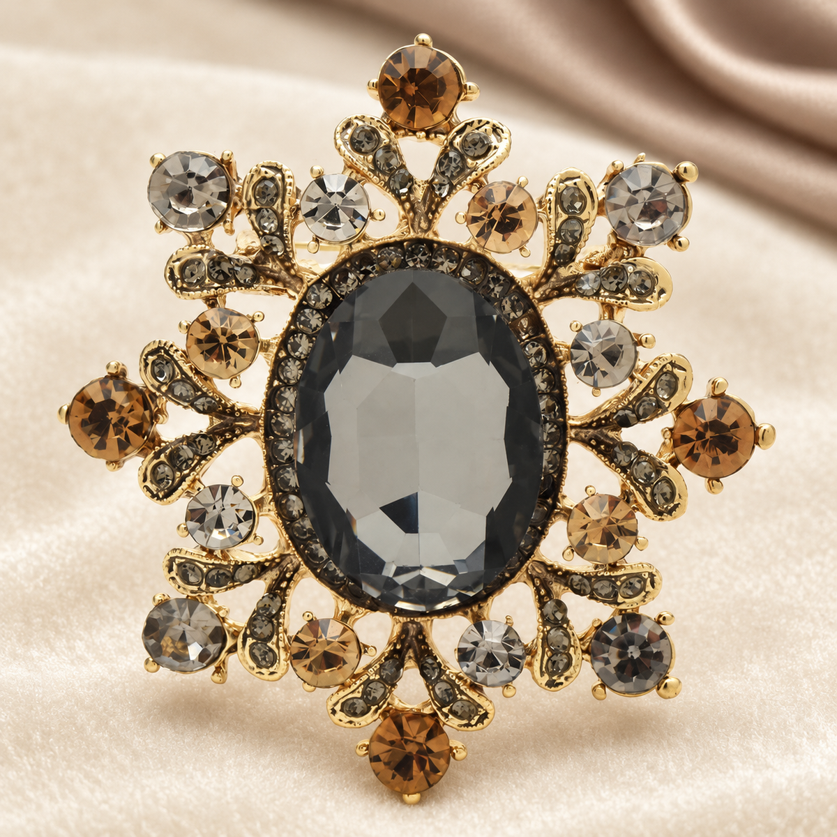 Ornate Oval Faceted Stone Brooch — styled background