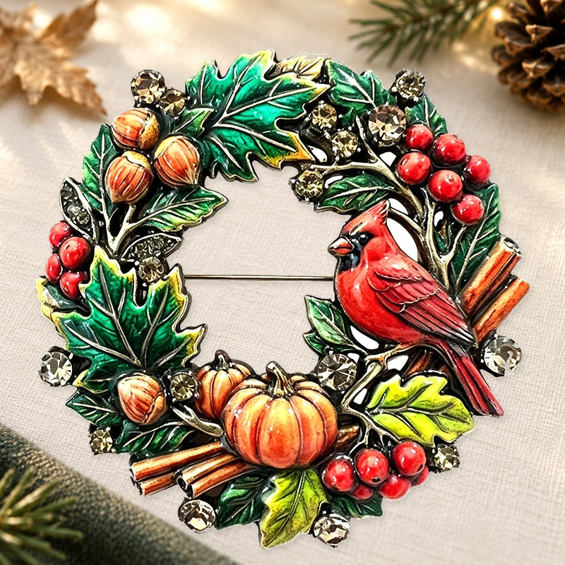 Cardinal and Harvest Wreath Brooch on a complementary display background
