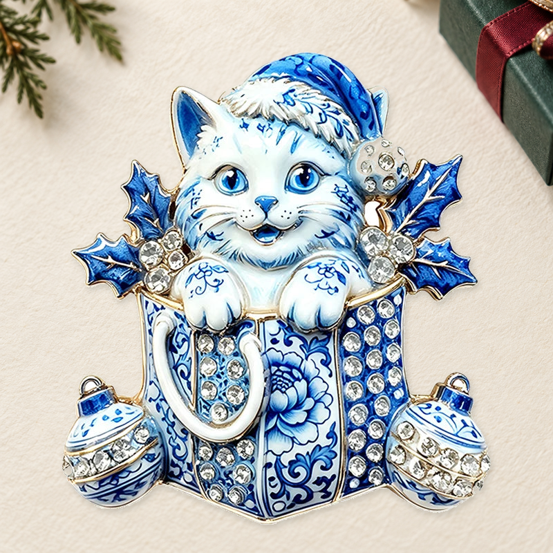 Christmas Kitten in Gift Box Brooch on an ivory themed backdrop