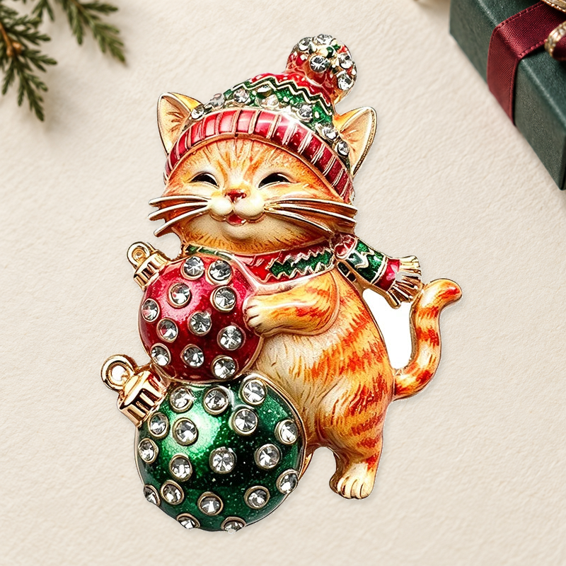 Christmas Kitten with Oversized Baubles Brooch on a complementary display background