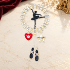 Dancing Ballerina and Ballet Charm Brooch on a motif themed ivory backdrop