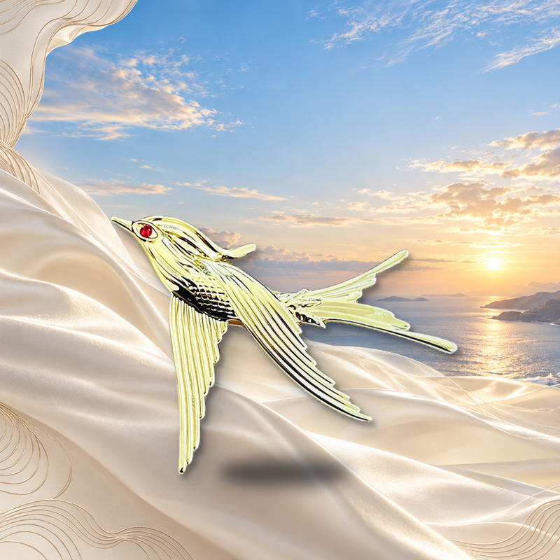 Engraved Flying Swallow Brooch styled in a thematic scene