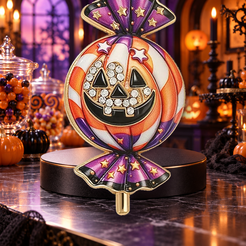 Halloween Pumpkin Wrapped Candy Brooch styled in a thematic scene