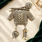 Knitted Sweater and Yarn Charm Brooch on an ivory themed backdrop
