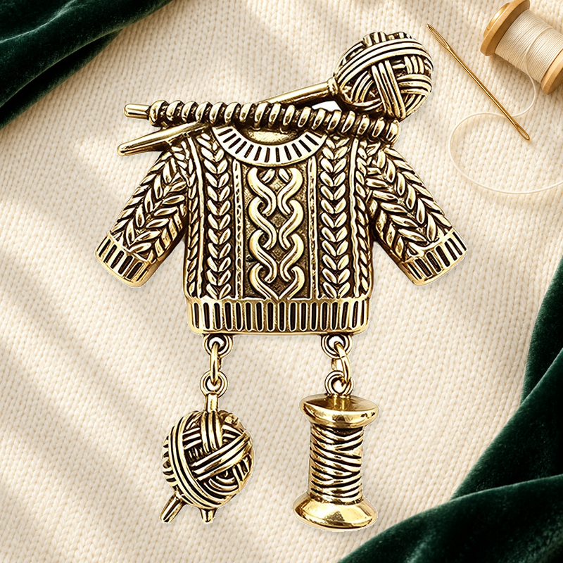 Knitted Sweater and Yarn Charm Brooch on an ivory themed backdrop