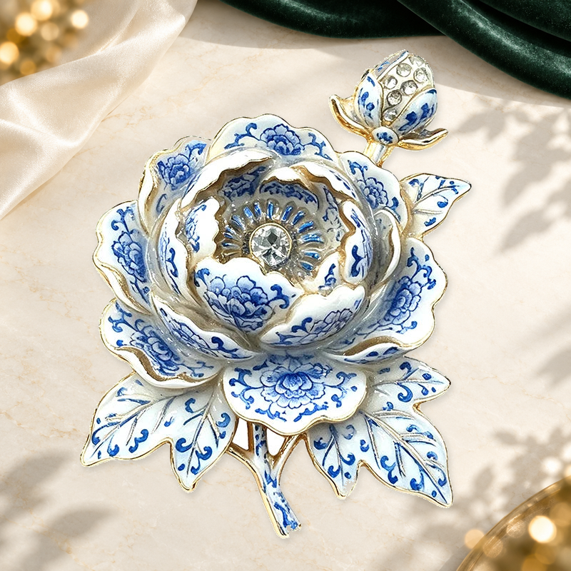 Layered Peony with Bud Brooch styled ivory evergreen and gold background