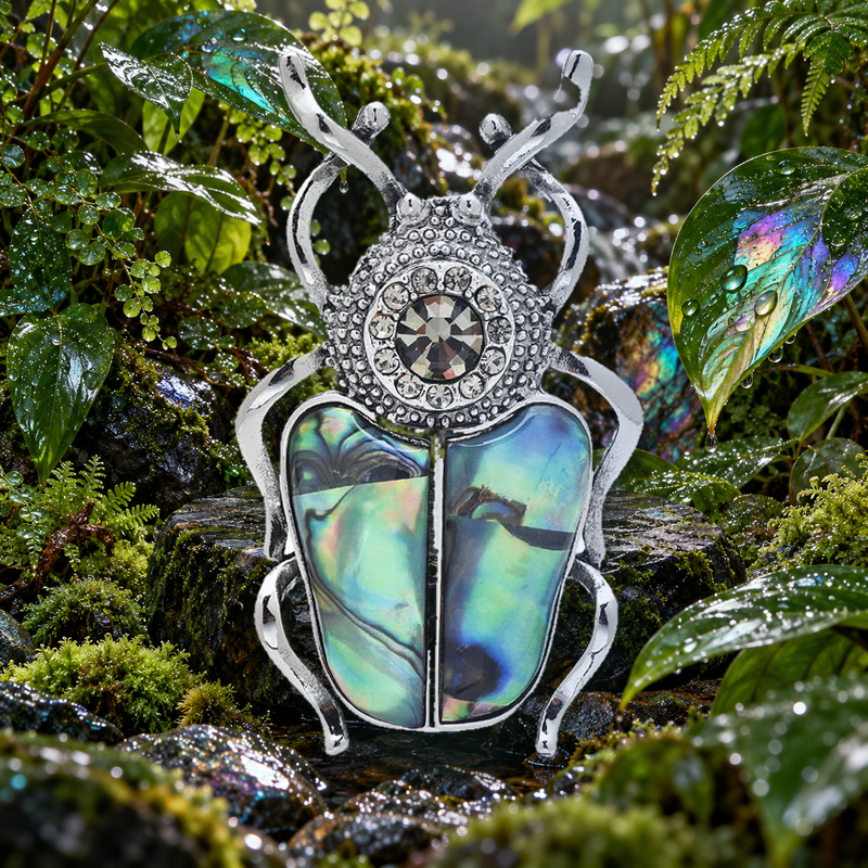 Natural Shell Beetle with Jeweled Head Brooch styled in a thematic scene