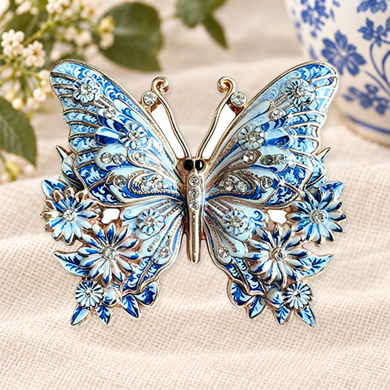 Patterned Garden Insect Motif Brooch on a motif themed ivory backdrop