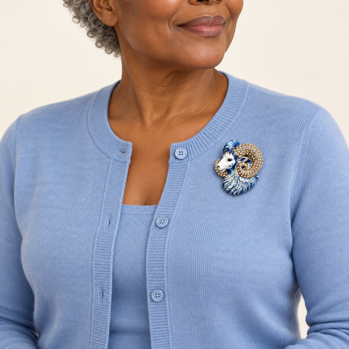 Patterned Ram Head Sparkle Brooch worn with a coordinated outfit