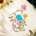 Sparkling Rabbit with Butterfly and Flower Brooch on a complementary display background