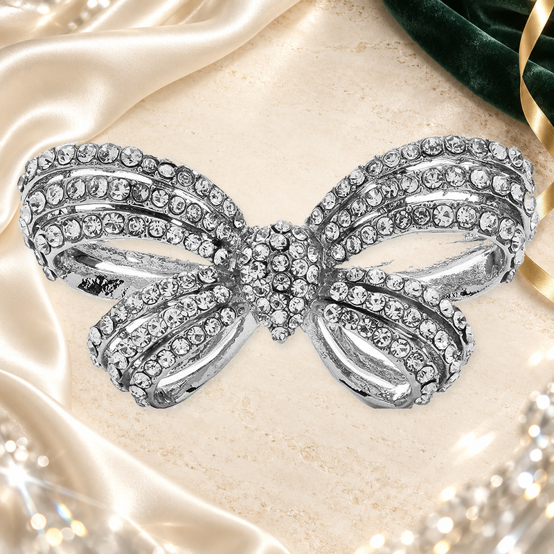 Sparkling Rhinestone Ribbon Bow Brooch on an elegant ivory, evergreen and gold background