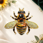 Striped Bee with Sparkling Wings Brooch on a complementary display background