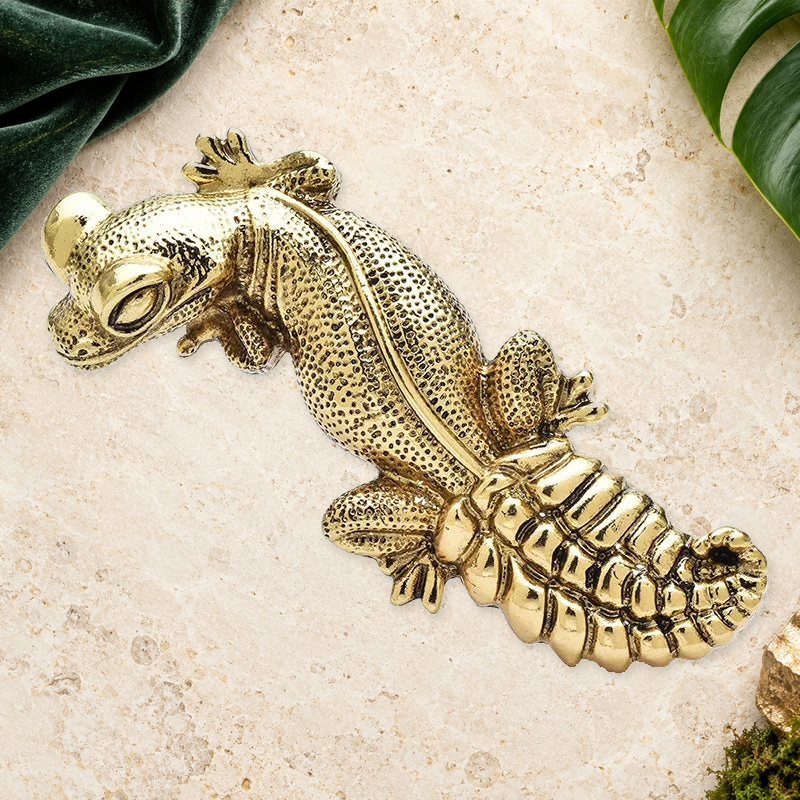 Textured Enamel Gecko Brooch on an elegant ivory, evergreen and gold background