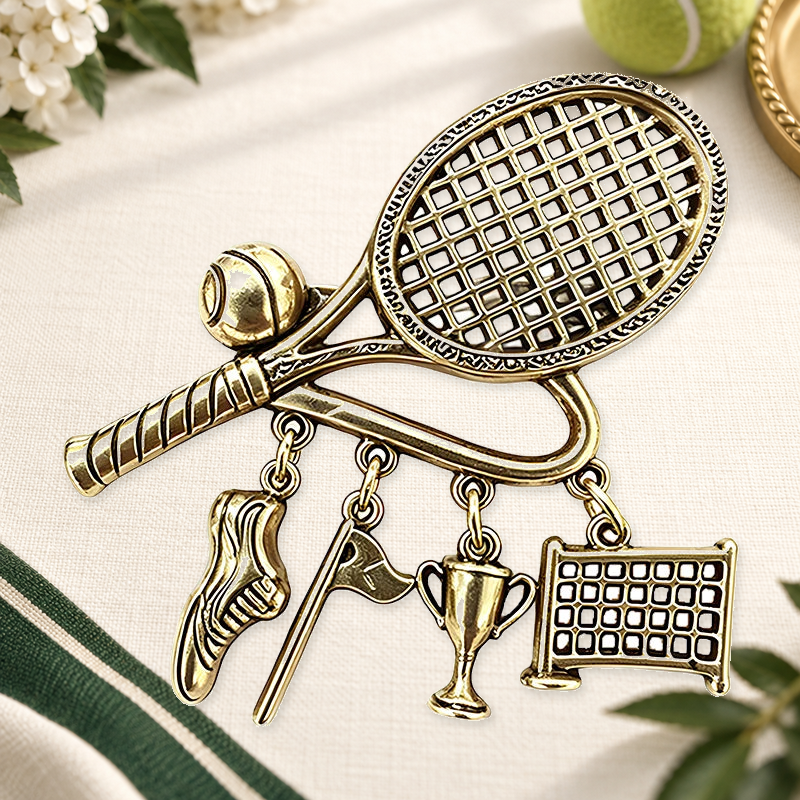 Vintage Tennis Racket Charm Brooch on an ivory themed backdrop